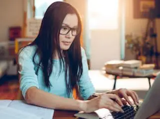 girl working on computer