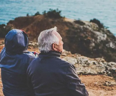 Couple sitting with a view