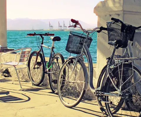 Biking along the Malaga harbor in Spain