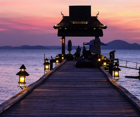 Sunset behind a pier in Thailand