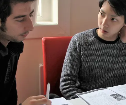 Teacher instructing a student