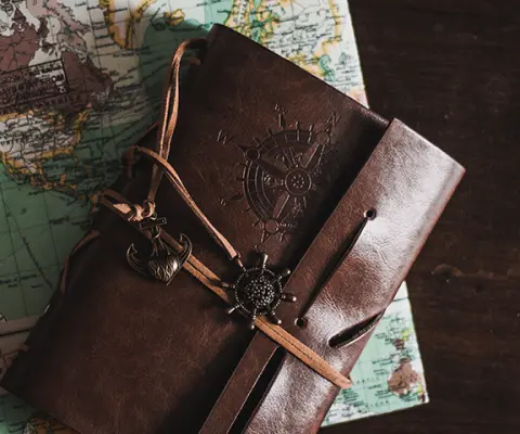 Travel journals on table