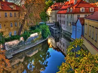 Canal and old houses in Kampa Island, Vltava in Prague